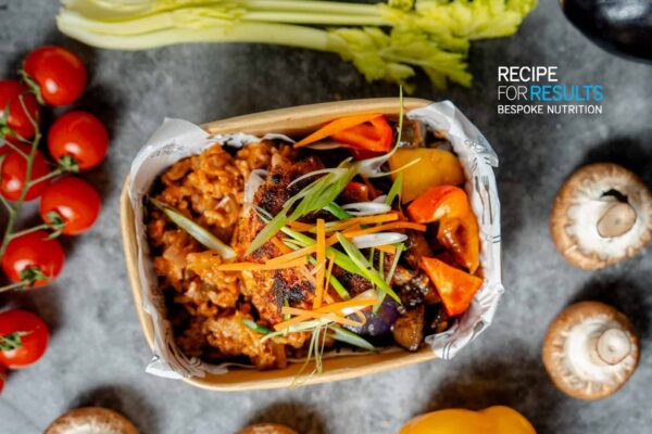 High-protein Moroccan chicken thigh with posh rice and roasted Mediterranean vegetables. Fresh, healthy meal prep delivered across Essex.